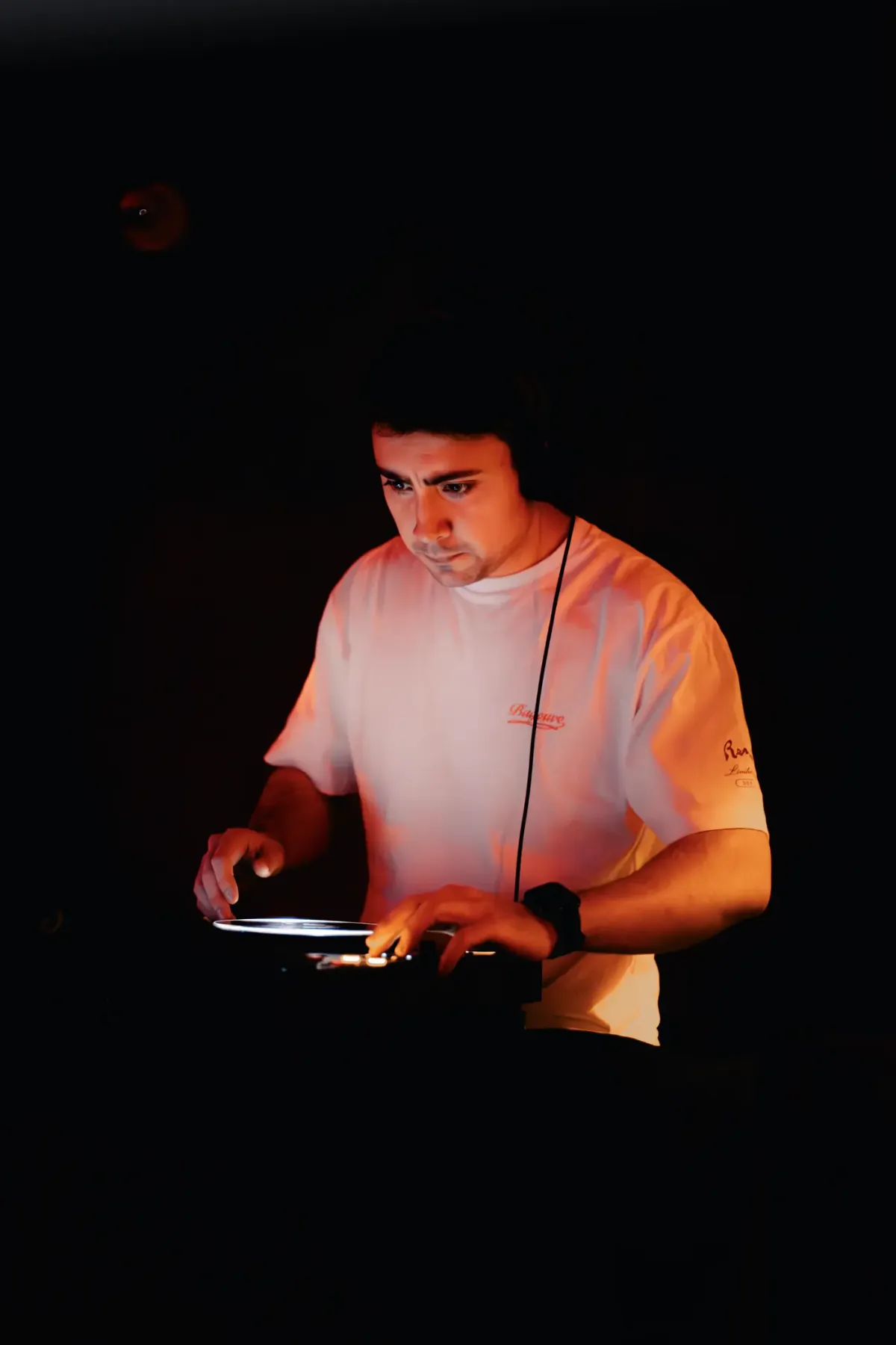 Caban concentrated during a live set on Lula the Club Madrid